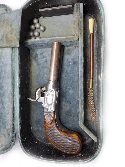 Double-barreled Pistol In A Box